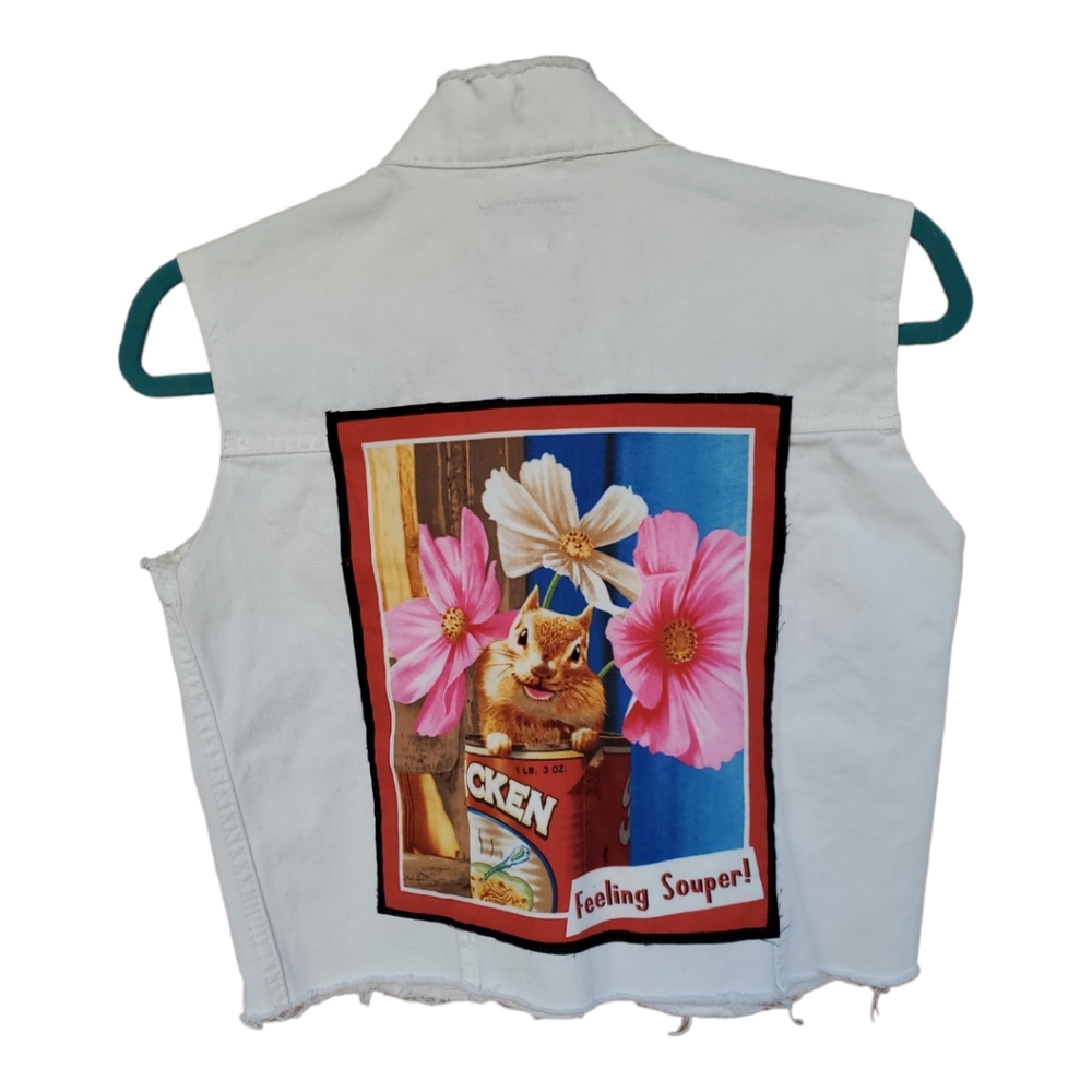 Sleeveless white jean vest with patch